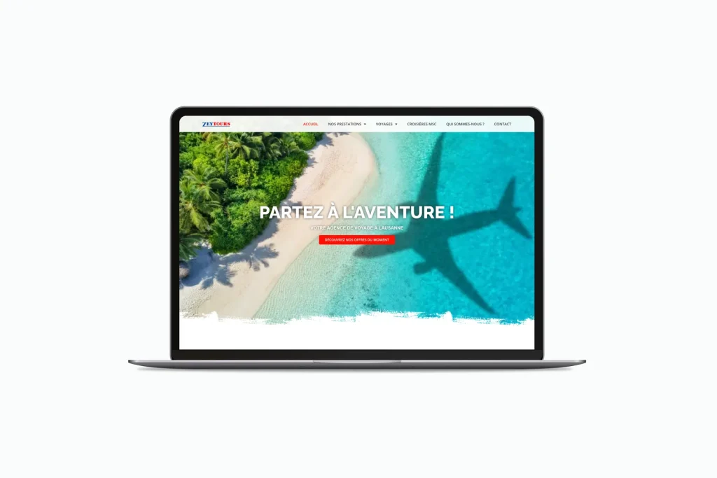 Site internet agence de voyage présenté sur un ordinateur portable