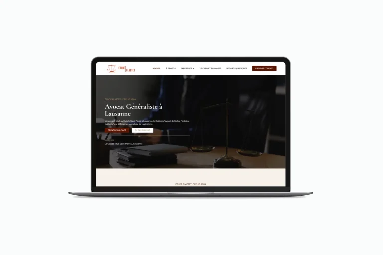 Site internet cabinet d'avocat présenté sur un ordinateur portable